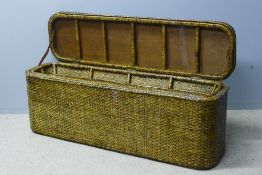 A large wicker laundry basket