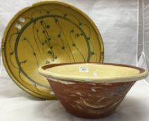 A terracotta bowl and another