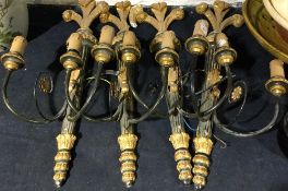 A set of four decorative wall lights