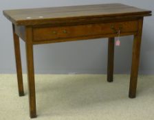 A 19th century oak tea table