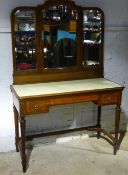 An inlaid mahogany dressing table