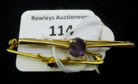 Two 9 ct gold amethyst set bar brooches (5 grammes all in)