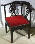 A George III mahogany corner chair