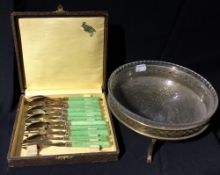 A quantity of knives and a glass and brass bowl