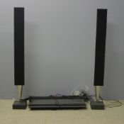 A Bang & Olufsen stereo system and speakers