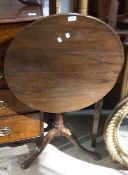 A 19th century mahogany tripod table