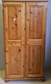 A modern pine wardrobe CONDITION REPORTS: Generally good condition, expected wear,