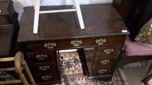 A 19th century mahogany kneehole desk