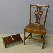 A 19th century country chair and a bookrack