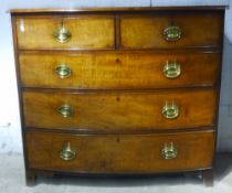 A 19th century mahogany bow front chest