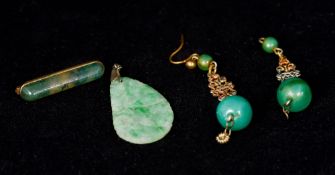 A pair of jade bead mounted earrings Together with a small jade carved leaf form pendant;