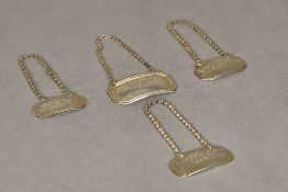 Four silver decanter labels One inscribed Bucellas, hallmarked probably for London 1810,