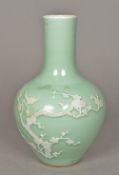 A Chinese celadon vase Of bulbous form with elongated neck,