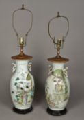A pair of Chinese Republican Period porcelain vases Each decorated with figures and calligraphy,