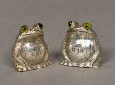 A pair of novelty silver cruets, hallmarked Birmingham 1977,