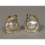 A pair of novelty silver cruets, hallmarked Birmingham 1977,