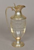A silver mounted etched glass claret jug, hallmarked London 1996,