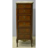 A small French marquetry inlaid marble topped chest of drawers The moulded canted marble top above