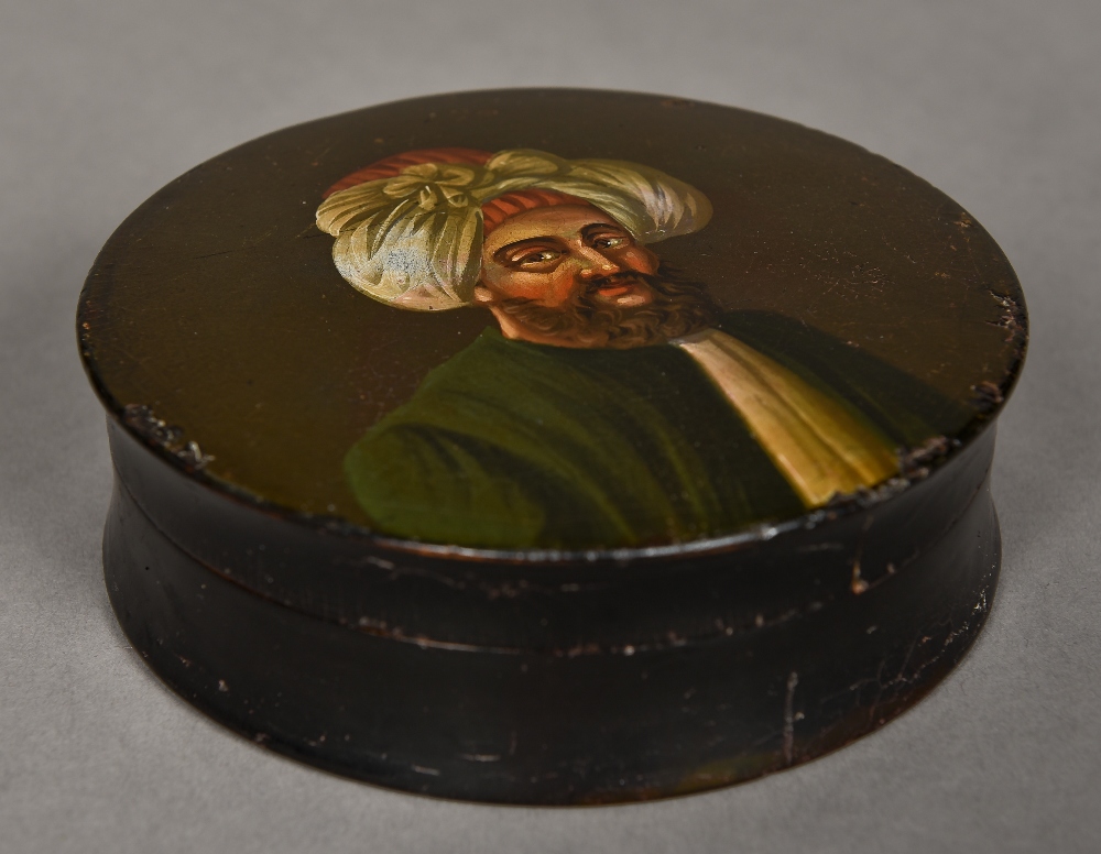 A 19th century papier mache table snuff box Of circular section,