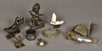 A small collection of various Oriental and Eastern items Including: two white metal models of junks,