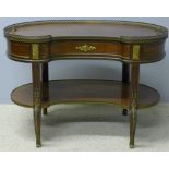 A late 19th century gilt bronze and brass mounted mahogany kidney shaped desk The shaped pierced