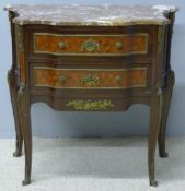 A French brass mounted marble topped commode The shaped top above two parquetry panelled shaped