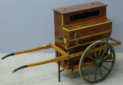 A barrel organ and cart Of typical form, in small proportions with painted decoration.