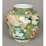 A Chinese famille verte porcelain vase Decorated in the round with children and female figures in a