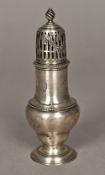 A George III silver sugar sifter, hallmarked London 1776 With pierced lid and interior sifter,