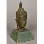 A 17th century or early Siamese bronze head of Buddha Well patinated with mother-of-pearl inlaid