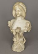 An Art Nouveau marble bust Carved as a young lady amongst floral sprays. 55 cm high.