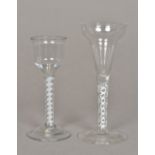 An 18th century pan-top air twist wine glass The shaped bowl above the double spiralled stem,