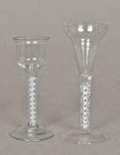 An 18th century pan-top air twist wine glass The shaped bowl above the double spiralled stem,