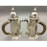 A pair of Victorian silver chocolate pots, hallmarked London 1868,