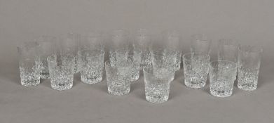 A set of ten cut lead crystal glass tumblers Each with facet and floral cut decorations;