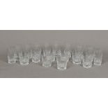 A set of ten cut lead crystal glass tumblers Each with facet and floral cut decorations;