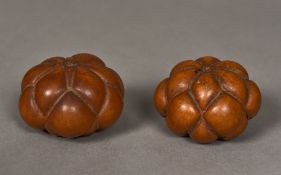 Two unusual lobed gourds Each of natural form. Each approximately 8 cm wide.