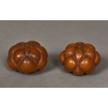 Two unusual lobed gourds Each of natural form. Each approximately 8 cm wide.