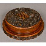 A Chinese carved hardstone box and cover Of circular section,