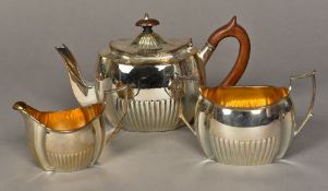 A Victorian silver three piece tea set, hallmarked London 1894,