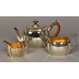 A Victorian silver three piece tea set, hallmarked London 1894,