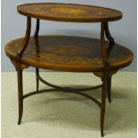 An Edwardian inlaid mahogany and satinwood two-tier etagere Of oval form,
