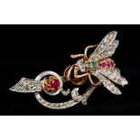 A 14 ct gold diamond, ruby and emerald en tremblant bug brooch, stamped 585 6 cm wide.