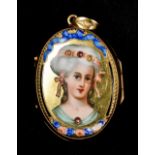 An unmarked gold enamel decorated locket One side with a glass panel,