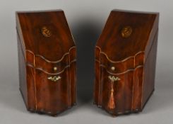 A pair of Georgian III mahogany serpentine knife boxes Each with shell inlaid hinged cover