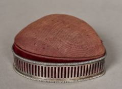 A George V silver framed heart-shaped pin cushion box, hallmarked London 1914,