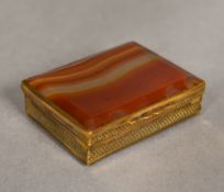 A 19th century gilt metal mounted agate desk seal box The rectangular hinged lid enclosing a hinged