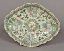 A 19th century Chinese Canton porcelain dish Of scalloped shaped form,