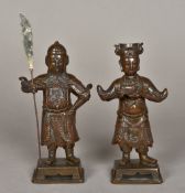 A pair of Chinese cast bronze figures One modelled as a guard holding a spear,