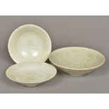 A small pair of Chinese Song dynasty petal edged "combed" flower design dishes Each glazed with a